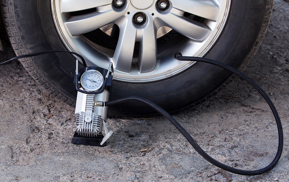 inflating the automobile wheels via a pump