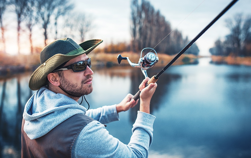 man wearing sunglasses for fishing