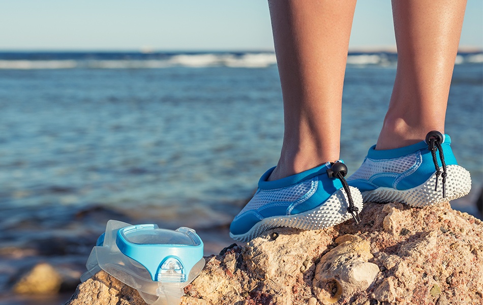 female feet in water shoes