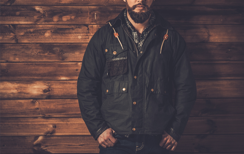 man wearing waxed canvas jacket