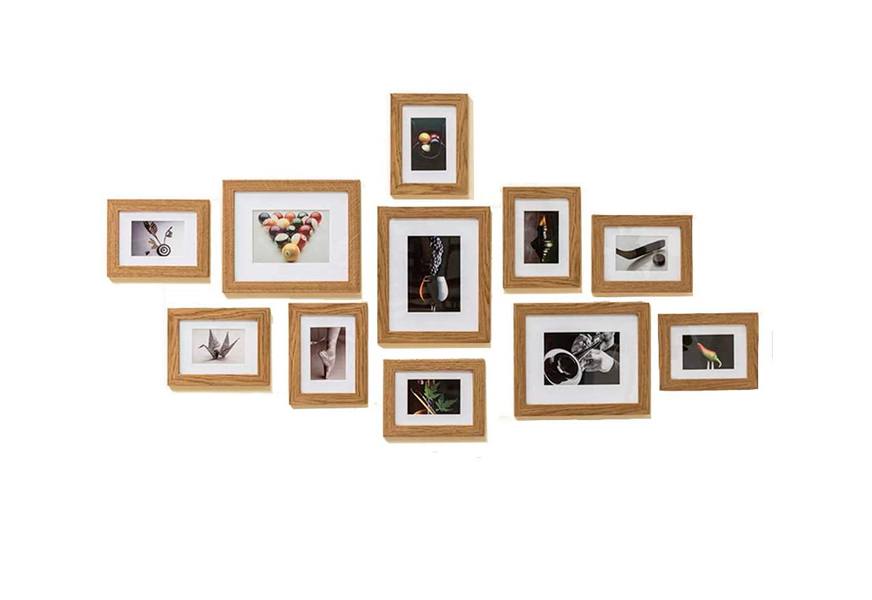 muzilife 11 piece collage picture frame set with an oak finish