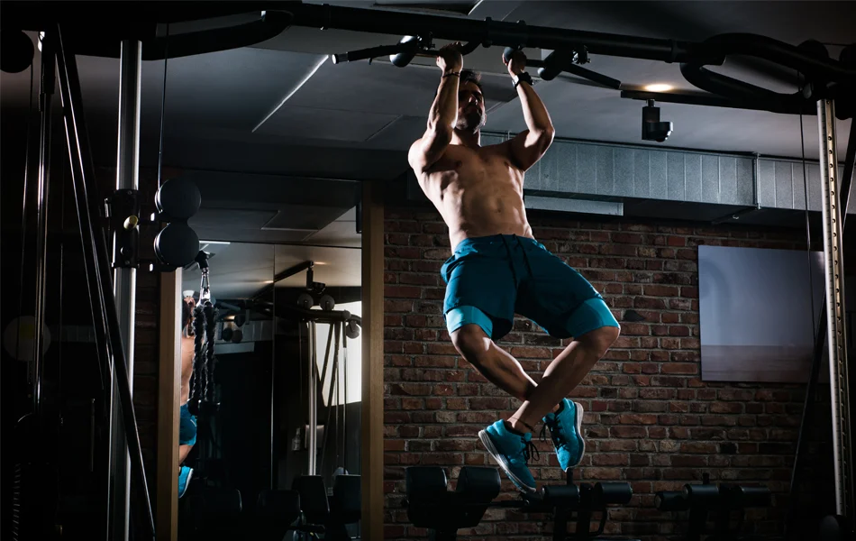 man on free standing pull up bar faq