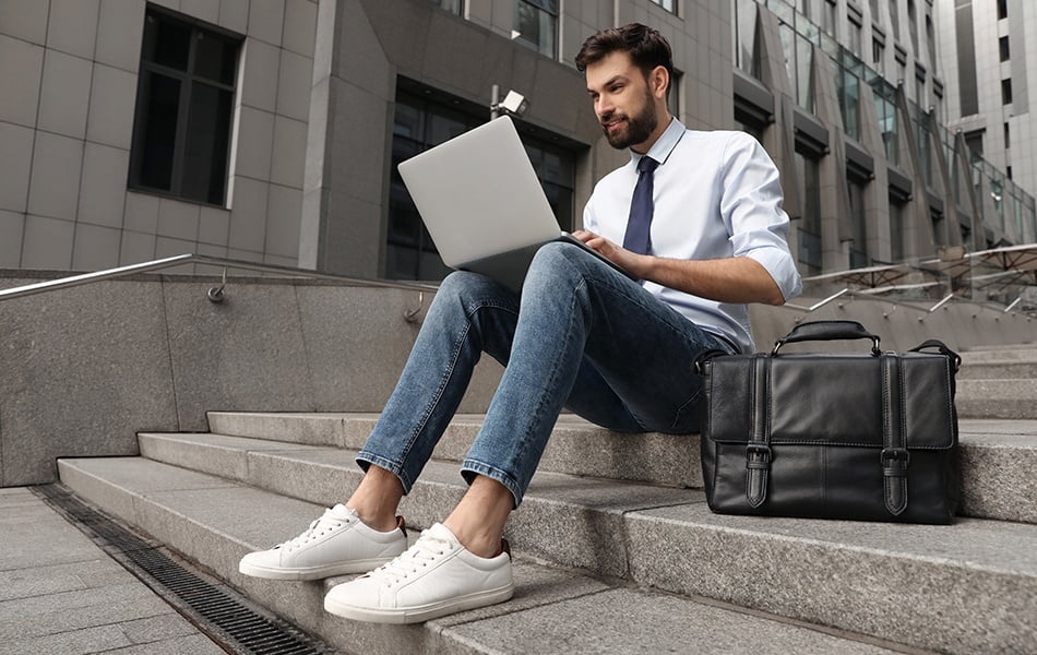 man working with laptop