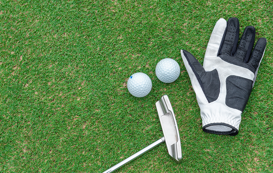 golf gloves on grass