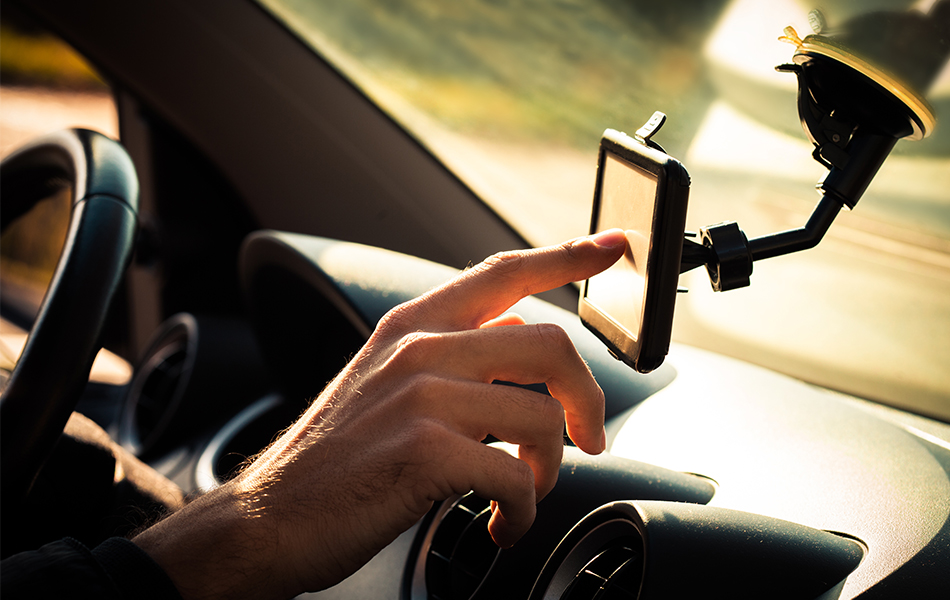 man using a car gps navigation system