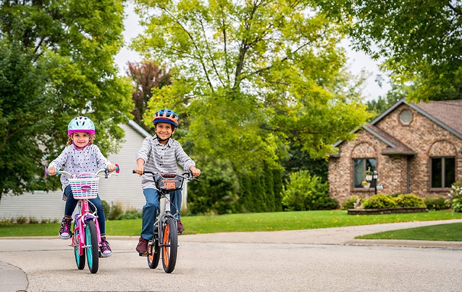 boy and girl riding bikes