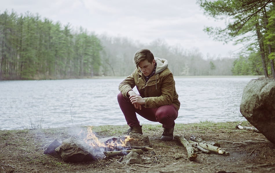 man wearing green field jacket