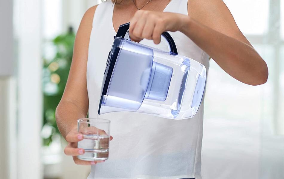 pouring water with water pitcher