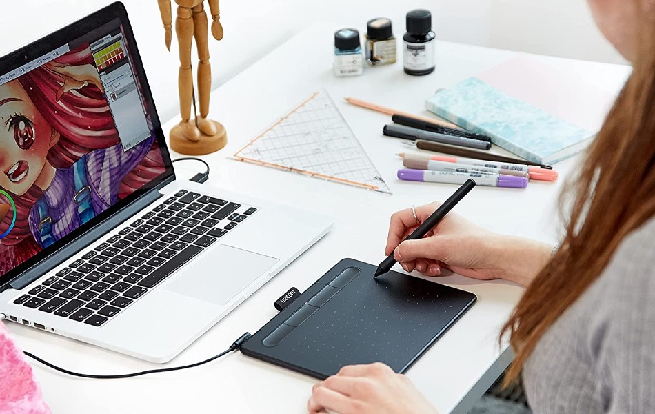 women using drawing tablet for her work
