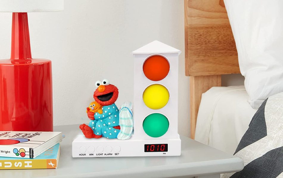 alarm clock for kids on the bedside table