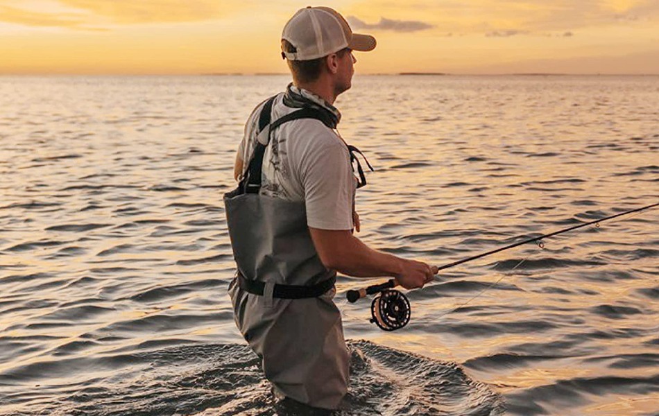 man fishing in wader pants
