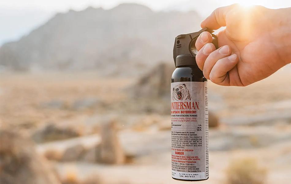 man holding bear spray