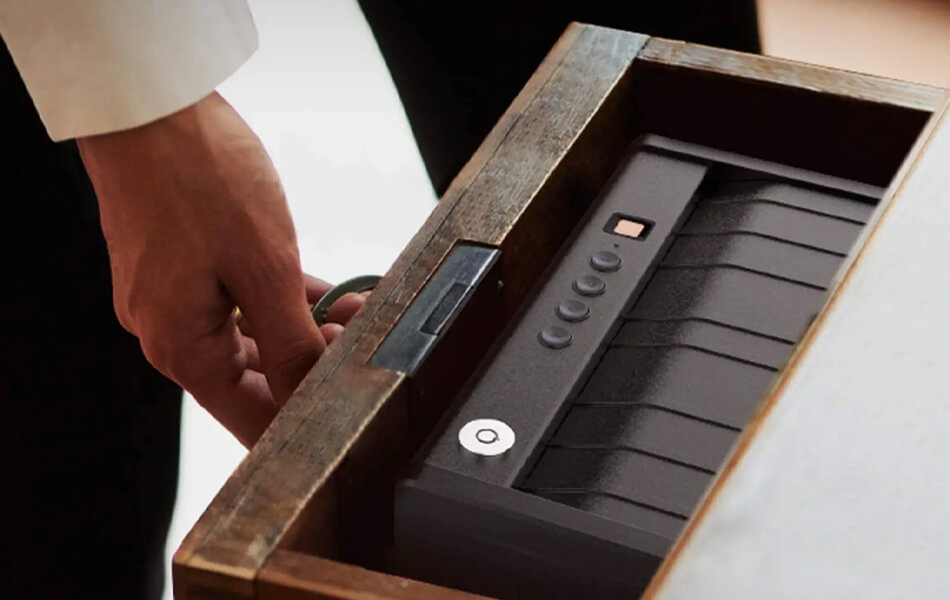 man opening gun safe