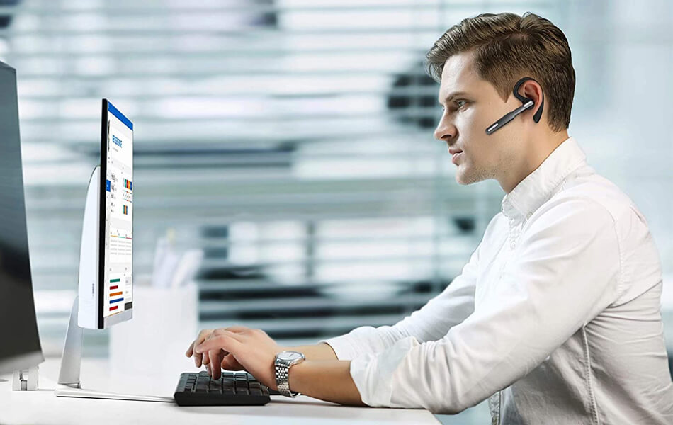 man using bluetooth headset