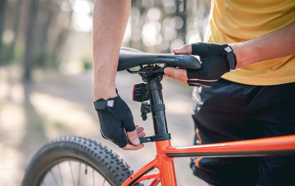 man wearing cycling gloves