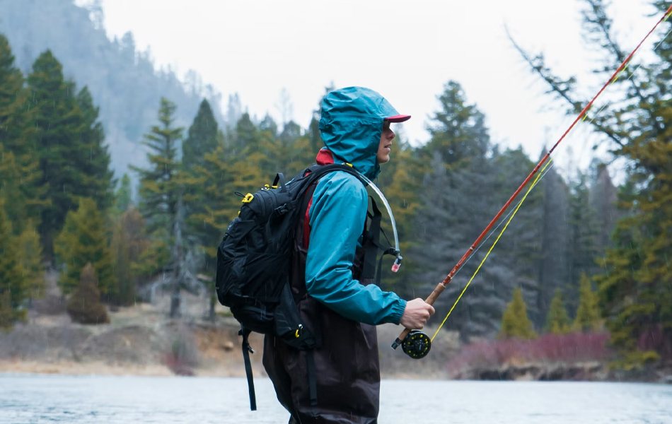 man wearing fishing backpack
