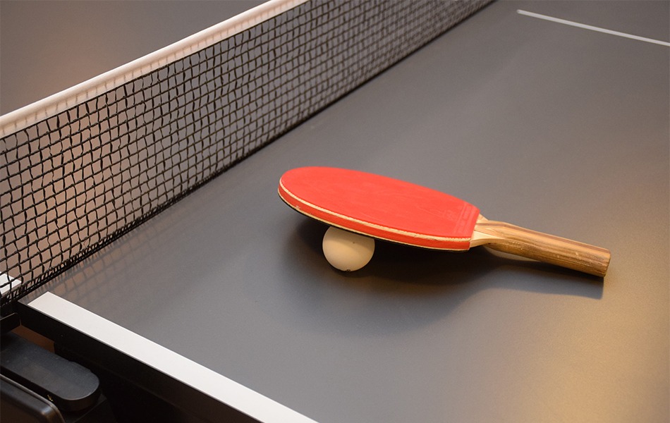ping pong paddle and ball