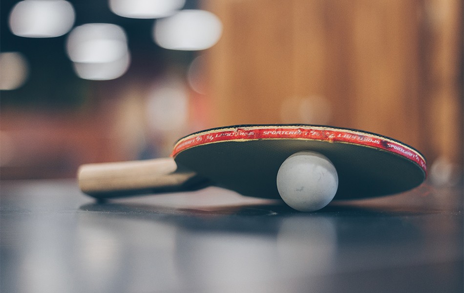 ping pong paddle on a table