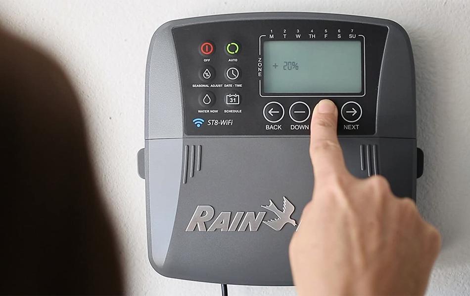 woman setting up the smart sprinkler system