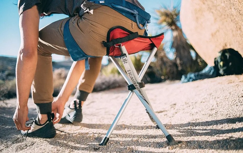camper sitting on the backpacking chair