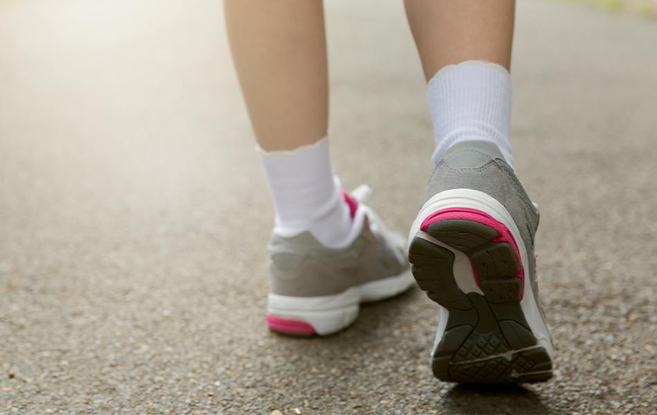girl in running shoes for kids