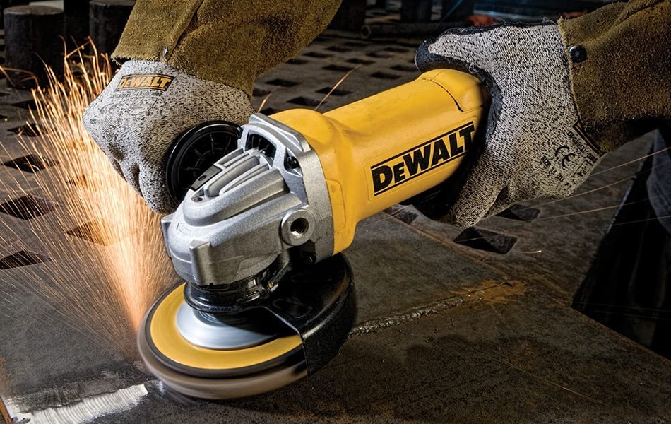 man using angle grinder