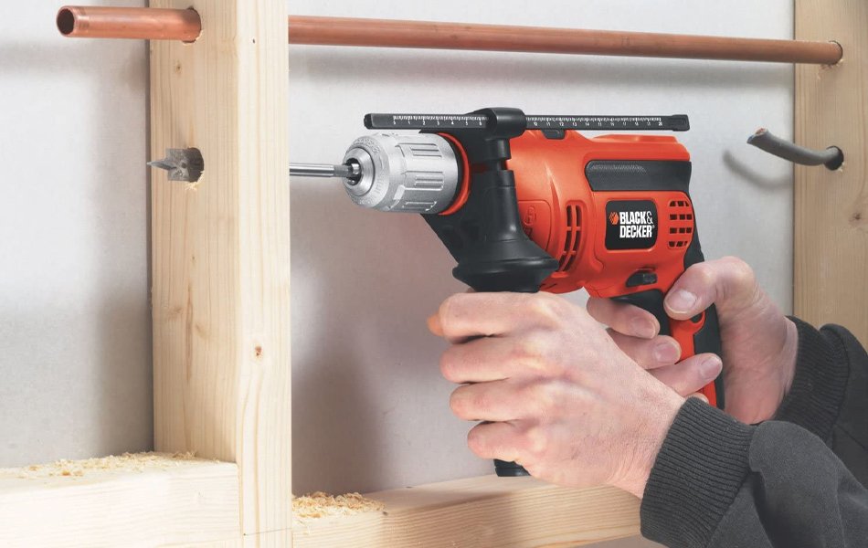 man using hammer drill