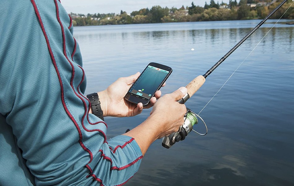 man using portable fish finder