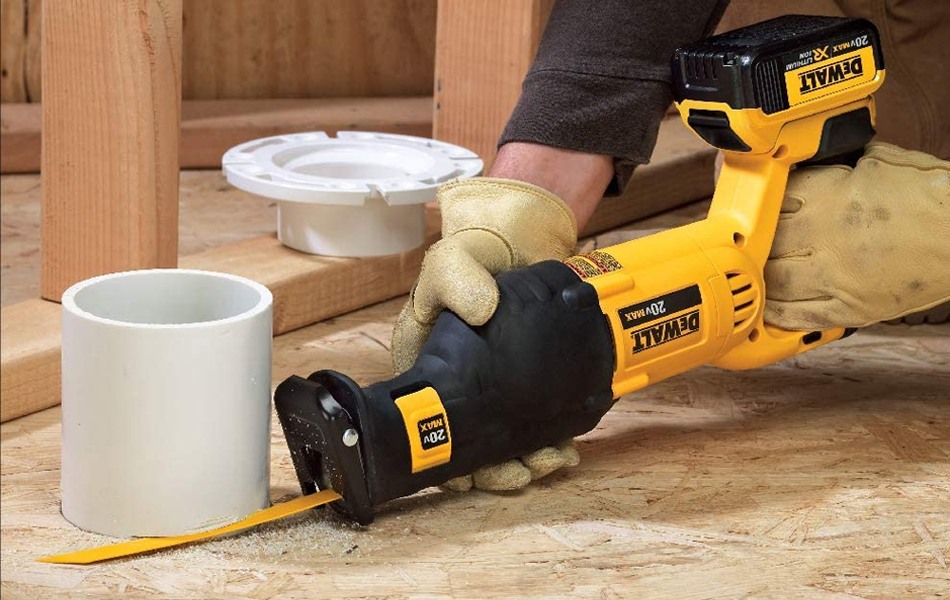 man using reciprocating saw