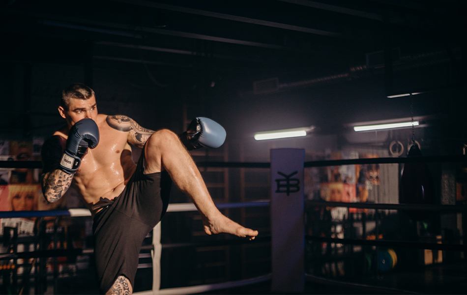 man wearing kickboxing gloves