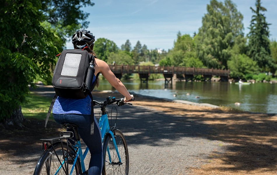 woman wearing solar powered backpack