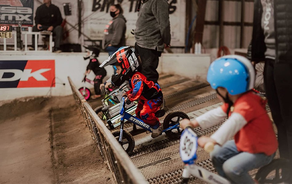 boys on balance bikes